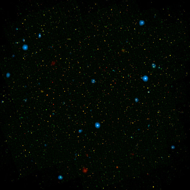 Insieme di galassie contenenti buchi neri supermassicci le cui emissioni di raggi X sono state identificate (Immagine NASA/JPL-Caltech)
