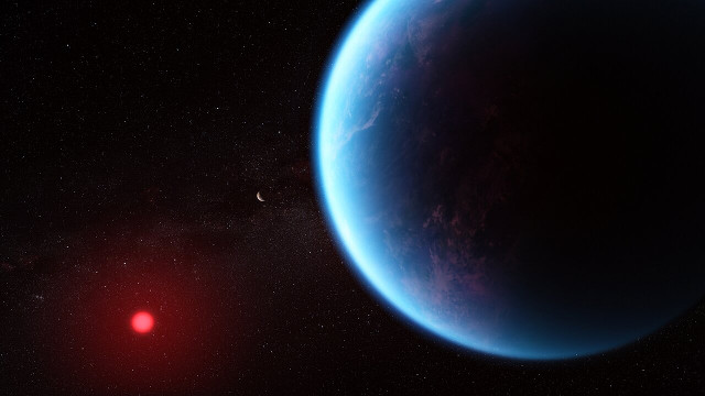 Concetto artistico dell'esopianeta K2-18 b con la sua stella sullo sfondo (Immagine NASA, CSA, ESA, J. Olmstead (STScI), N. Madhusudhan (Cambridge University))